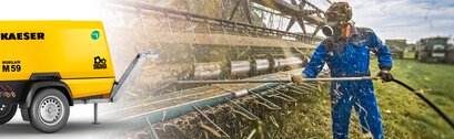 KAESER compressor used in cleaning of agricultural machinery